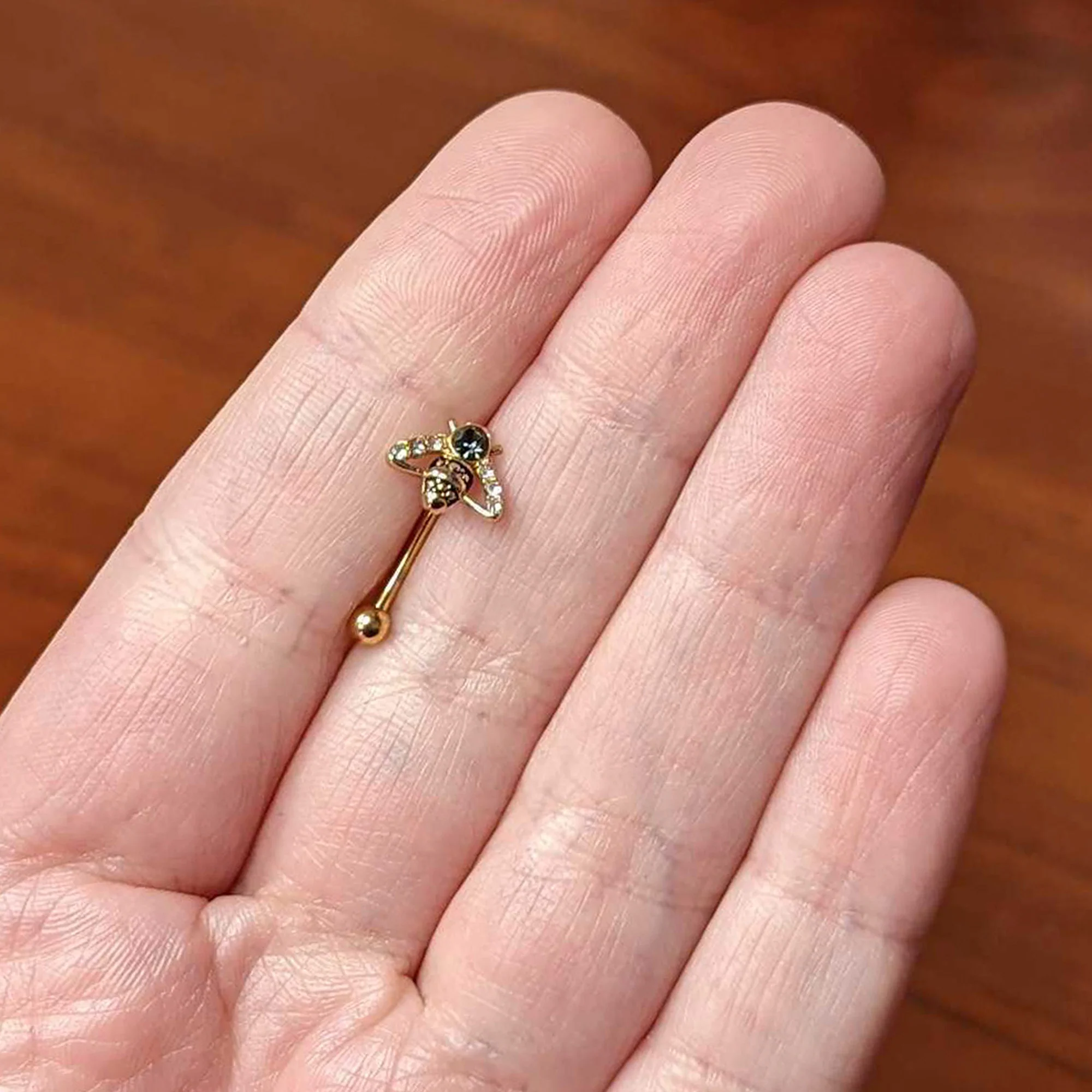 16G 5/16 Clear Black Gem Gold Hue Angular Bee Curved Eyebrow Ring - Image 3