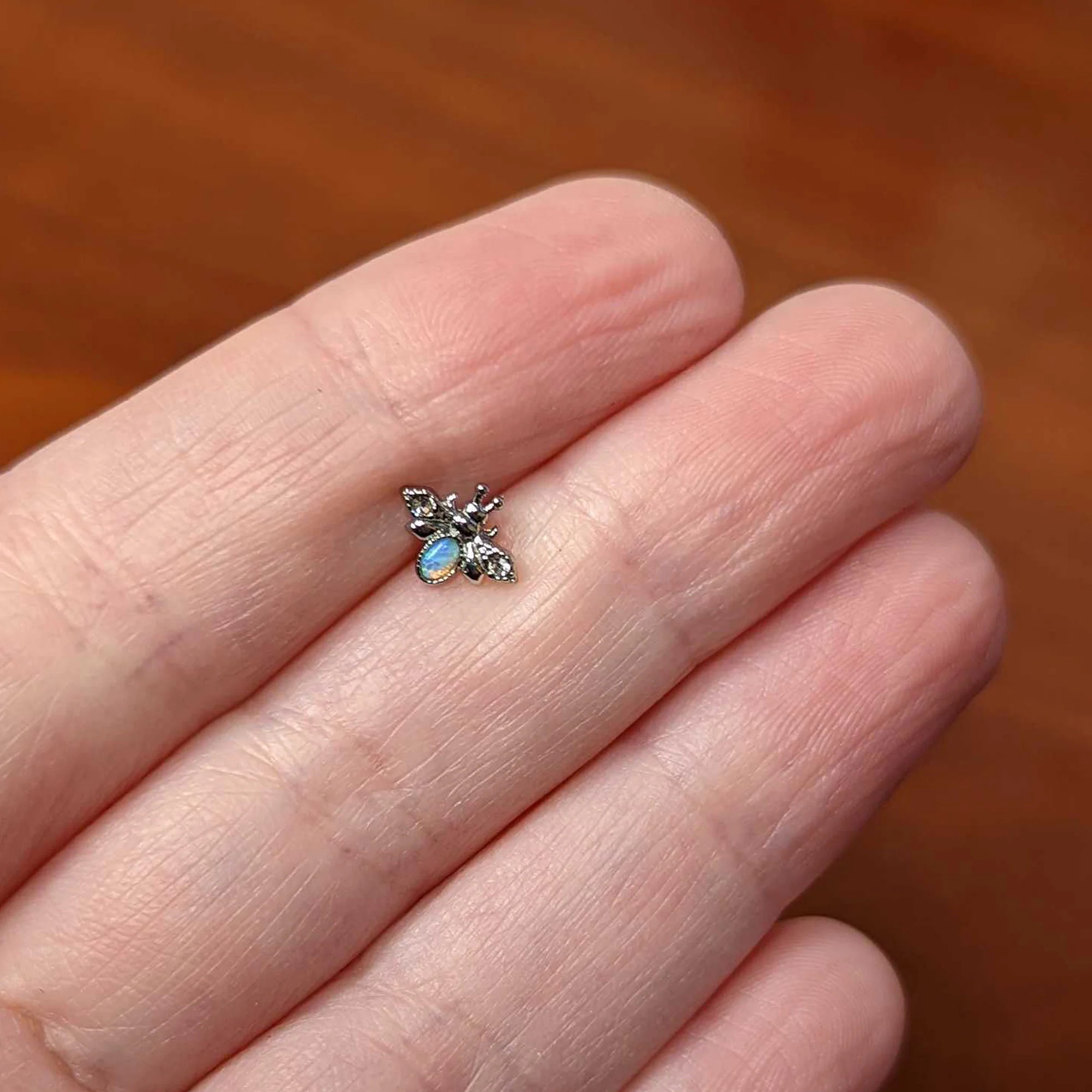 20G 1/4 White Synthetic Opal Insect Nose Bone - Image 5