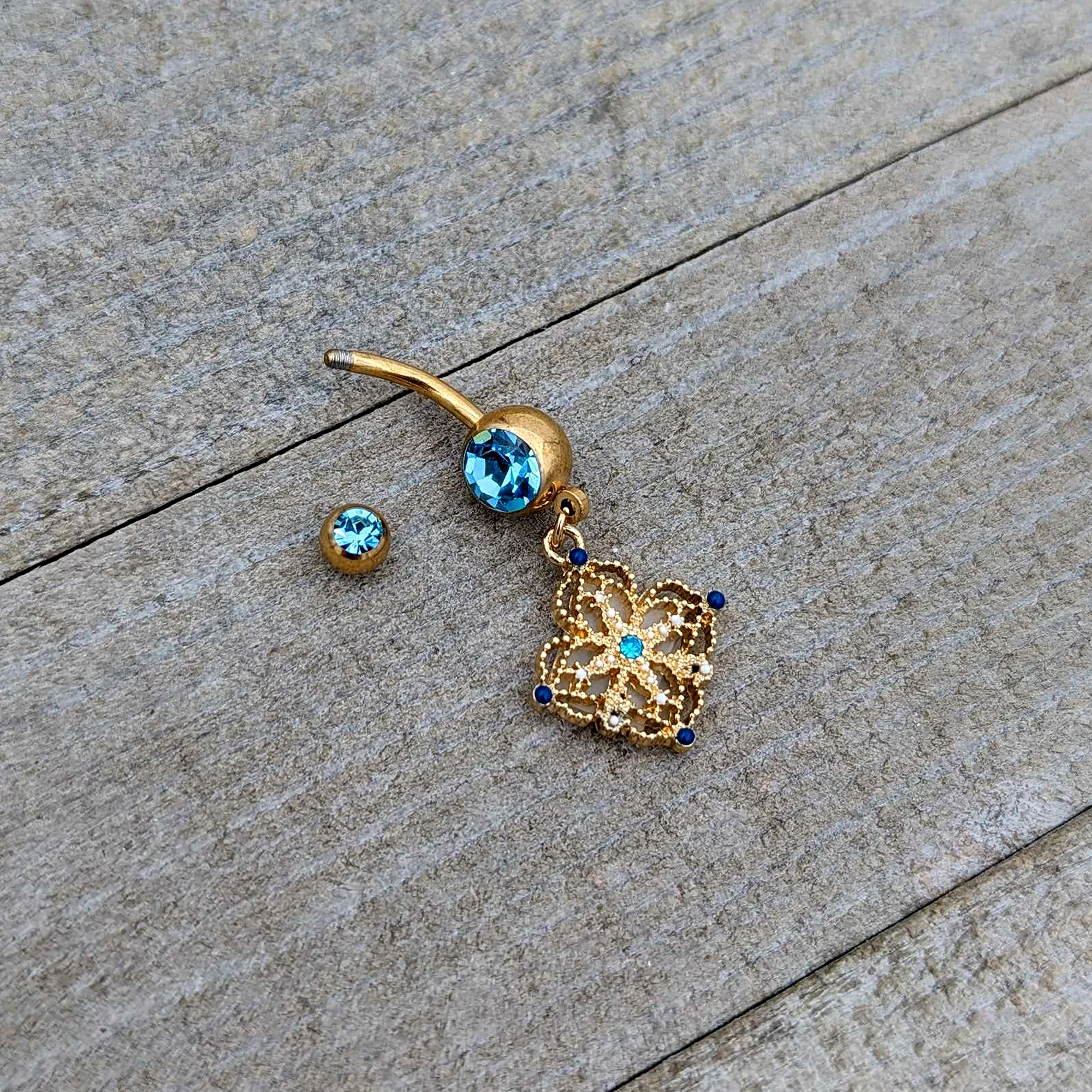 Blue Gem Gold Tone Texture Emblem Dangle Belly Ring - Image 6