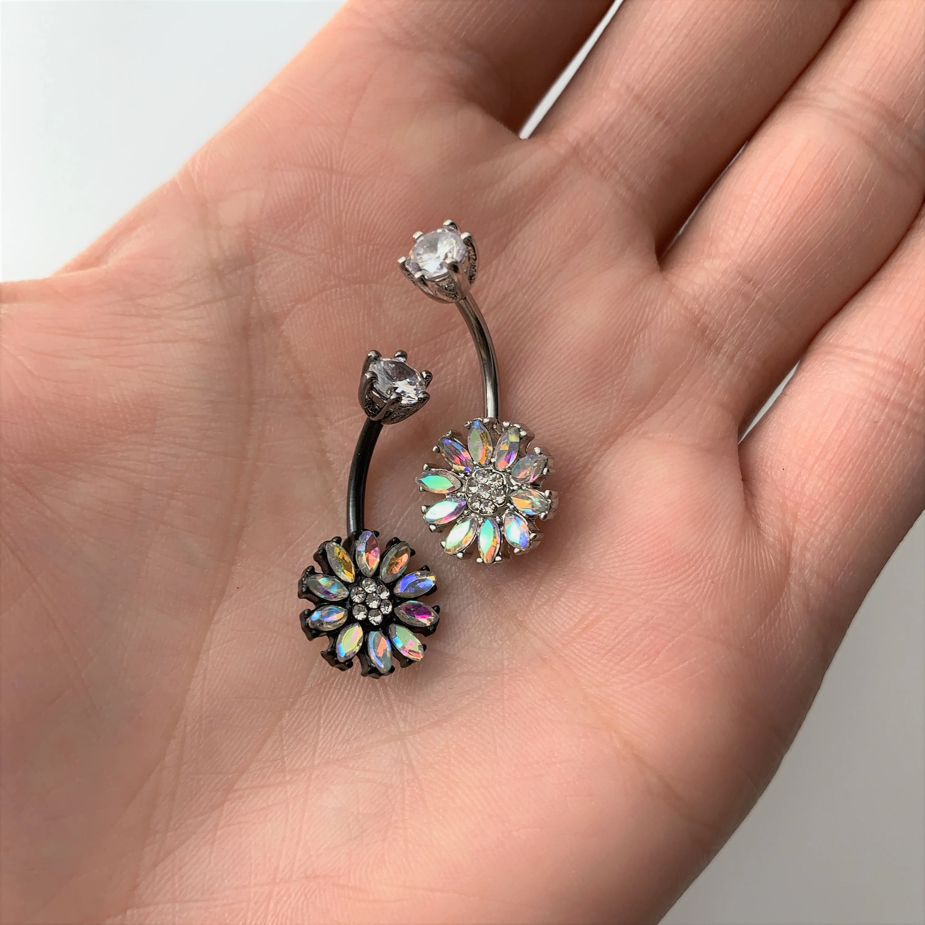 Clear Aurora CZ Gem Black Plated Flower Belly Ring - Image 2