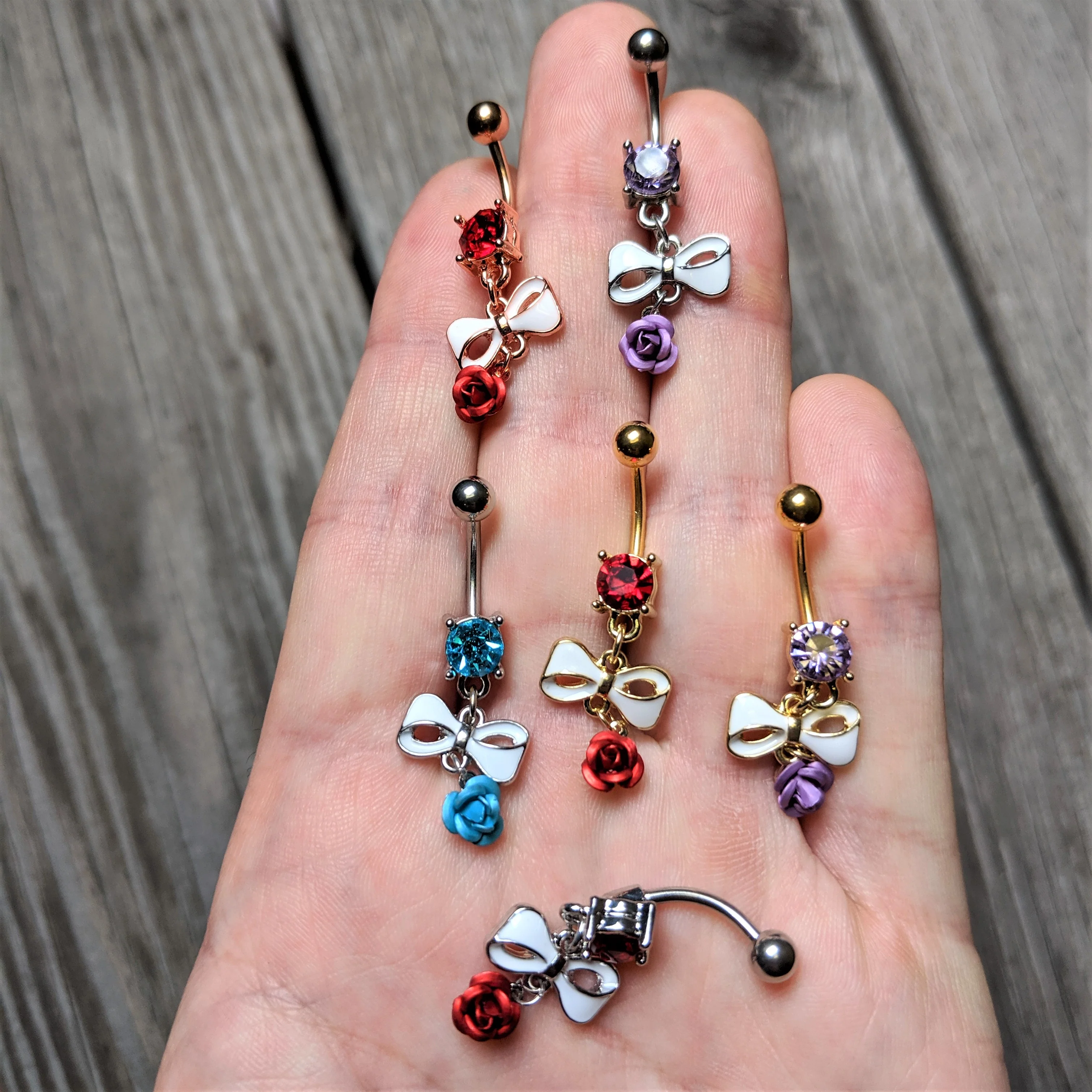 Red Gem Rose Gold Tone Bow Rose Flower Dangle Belly Ring - Image 2